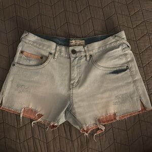 EUC Free People blue denim distressed jean shorts with interior stripe detail
